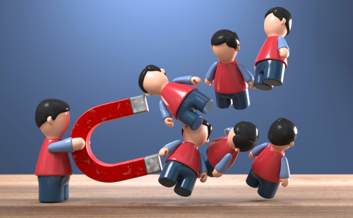 磁石で人を吸い寄せている